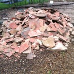 Heap of flagstone to prepare the courtyard area.
